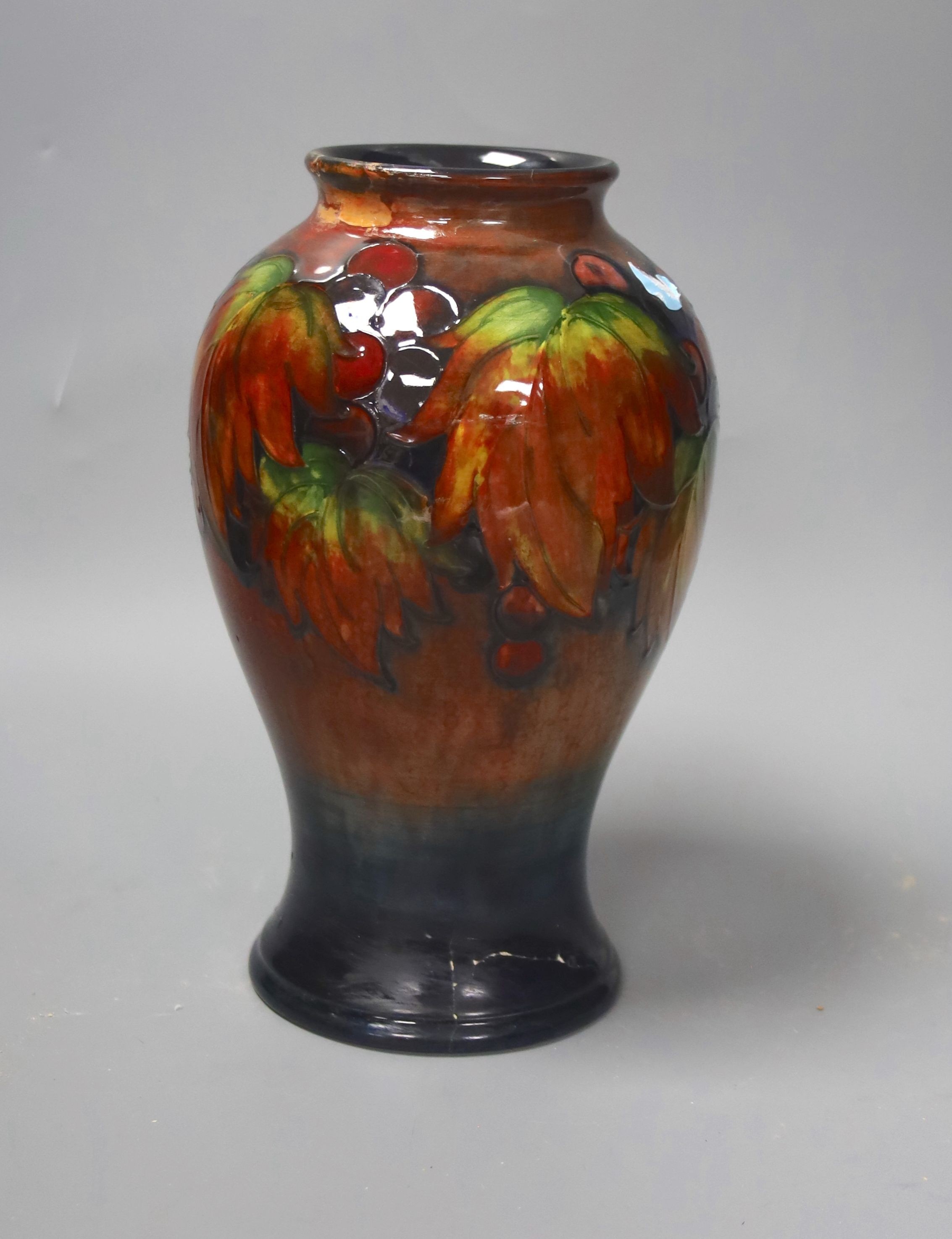 A Moorcroft flambe leaf and berry baluster vase (a.f.) 23.5cm